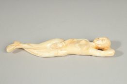 A CARVED BONE DOCTOR'S FIGURE. 5ins long.