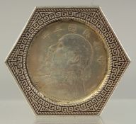 A CHINESE HEXAGONAL CASED CHINESE COIN. 2ins.