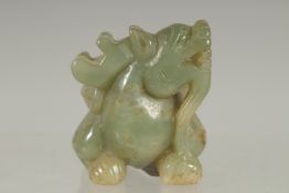 A CHINESE CARVED JADE DOG OF FO. 1.75ins