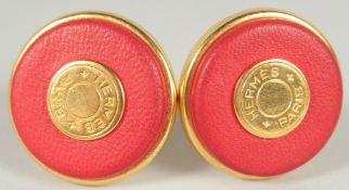 A GOOD PAIR OF HERMES OF PARIS RED STONE EAR CLIPS. 2.5cm diameter.