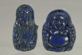 TWO CHINESE CARVED LAPIS PENDANTS.