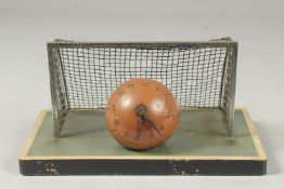 A RARE PIECE OF FOOTBALL MEMORABILIA, a goal with a football. 2.75ins diameter as a clock. Goal