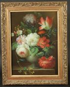 Thomas Lee (20th Century) A still life of mixed flowers in an urn, oil on canvas, signed, 16
