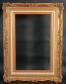 A 20th Century gilt composition frame, rebate size to the linen slip 20