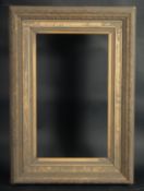 A 19th Century Continental gilt composition frame, rebate size 10.5