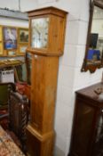 A pine cased longcase clock with 30 hour movement and painted square dial.