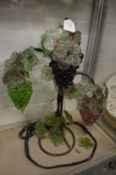 An unusual colourful moulded glass grape and vine table lamp.