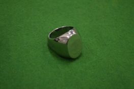 A stainless steel signet ring, size O/P.