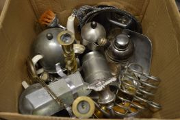 Brass candlesticks, cocktail shaker and other metalware.