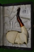 A large figural Meerschaum pipe, boxed.