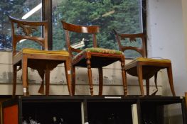 Three dining chairs.