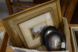 A group of small paintings.