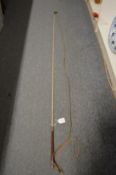 A carriage driving whip.