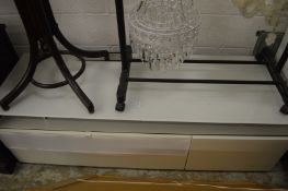 A stylish plasma screen tv stand.