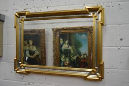 A decorative wall mirror with moulded rectangular frame.