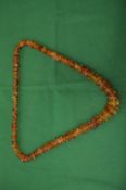 An amber bead necklace.