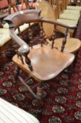 A 19th century beech and elm smokers bow chair.
