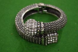 A decorative bangle.