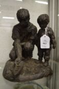 Karin Jonzen, limited edition bronze resin sculpture of a father and son no: 336/500 with