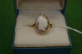 A 10ct gold ring mounted with a cameo size Q.