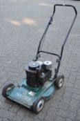 A Hayter Hayterette petrol rotary lawn mower.