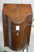 A George III mahogany serpentine fronted cutlery box.