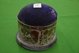 A good large hat pin cushion with embossed silver mount.