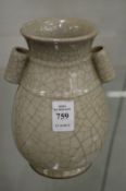 A Chinese crackle glazed twin handled vase.