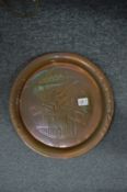 A Johnny Walker copper tray.