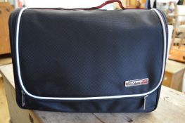 A bag of car cleaning equipment.