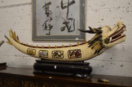 A large and impressive Chinese sectional bone model of a dragon fish with hard stone inlaid