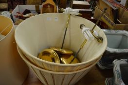 A pair of lamp shades and lamp mounts.