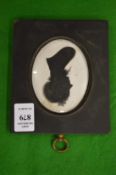 A 19th century silhouette portrait of a lady.