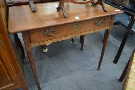 An 18th century oak side table.