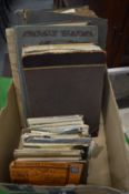 Postcard albums with contents together with a quantity of loose postcards.
