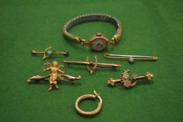 A group of 9ct gold jewellery and a ladies 9ct gold cased wrist watch.