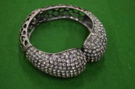 A decorative bangle.