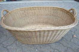 A large wicker twin handled basket.