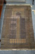 A Persian prayer rug 150cm x 85cm.