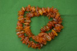 An amber bead necklace.