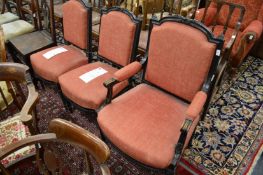 Victorian ebonised open armchair and a pair of matching side chairs (frames loose).