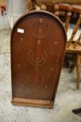 A bagatelle board.