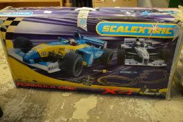 A boxed Scalextric set.