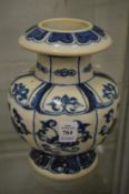 A Chinese blue and white vase.
