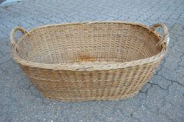 A large wicker twin handled basket.