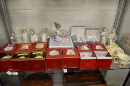 A collection of Lladro Christmas bells, figures, Bunnykins china etc.