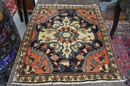 A good small Persian rug or mat 70cm x 58cm.