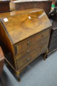 A mahogany bureau.