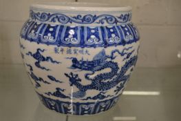 A large Chinese blue and white jardiniere.