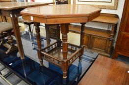 A late Victorian walnut octagonal shaped centre table.